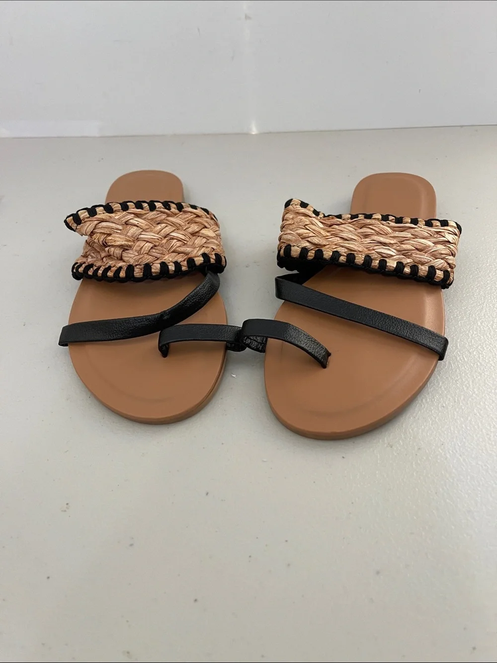 Woven Straw Slide Sandals with Black Straps